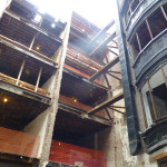 This image shows the original rear wall shoring process, highlighting structural support during renovations.